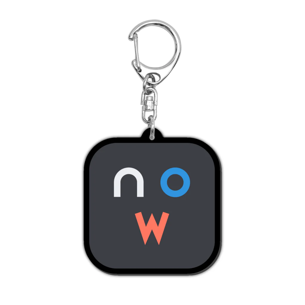 A black acrylic keychain, a rounded square with the nowthy mark, on a ring.